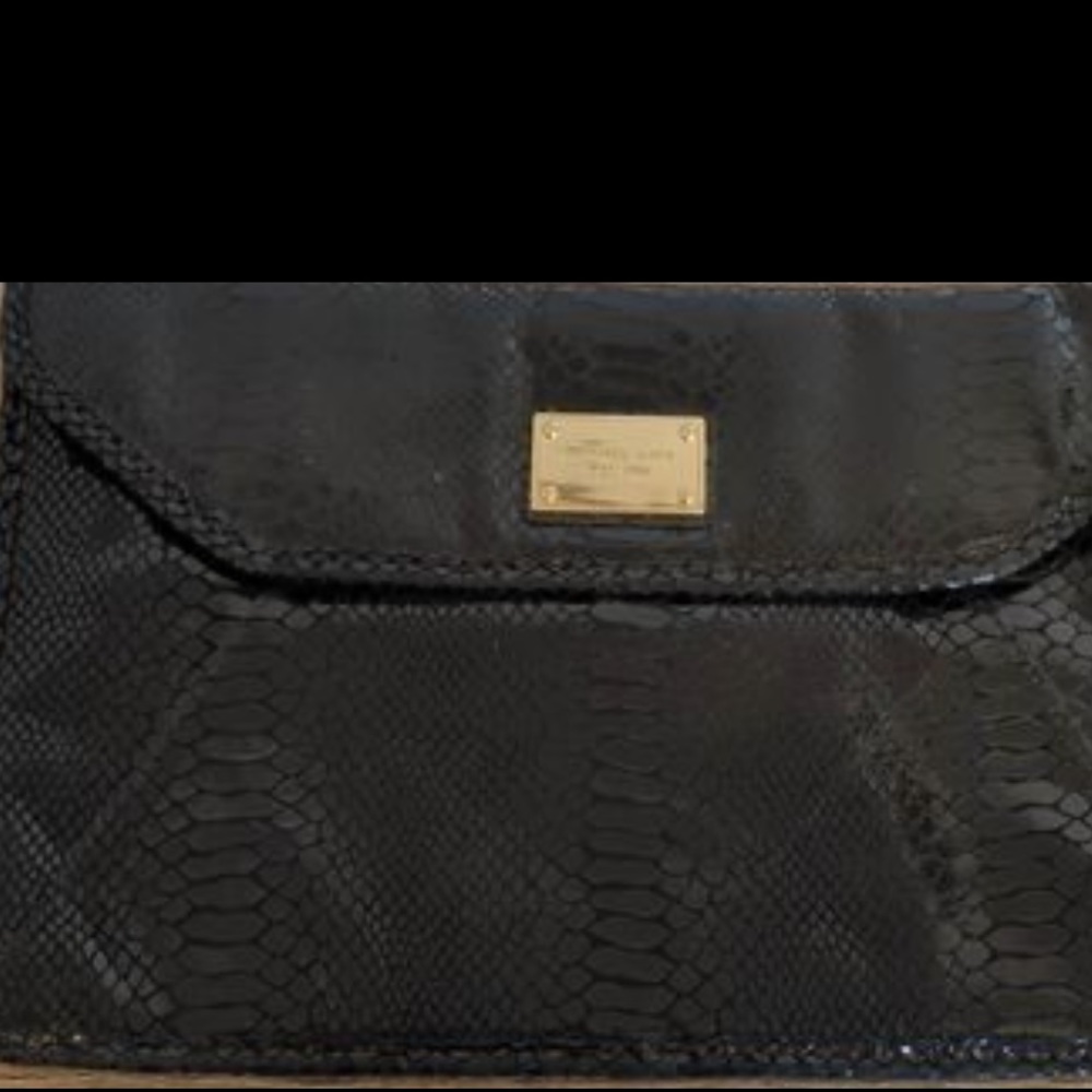 Good condition iPad sleeve and handbag set by Michael Kors.